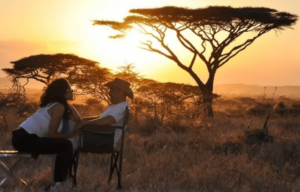 A Couple enjoy sunset at Murchison Falls National Park