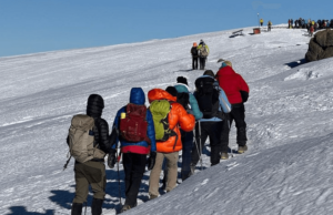 visitors hike to the top of Mount Kilimajaro,Tanzania